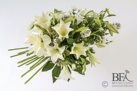 Pink or White Lily Flat Spray with Greenery