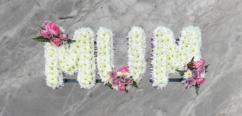 White Chrysanthemum "MUM" Letter Tribute with Coloured Ribbon and Corner Sprays